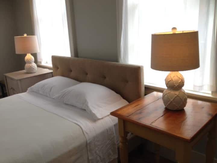 North bedroom Suite.  Located at the top of the stairs, this bedroom includes two rooms, one queen bed, one twin daybed, and a private half-bathroom.  You can rent this Suite alone, or book the entire house.