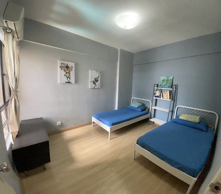 Second bedroom with 2 single beds and air-conditioning. (New flooring)