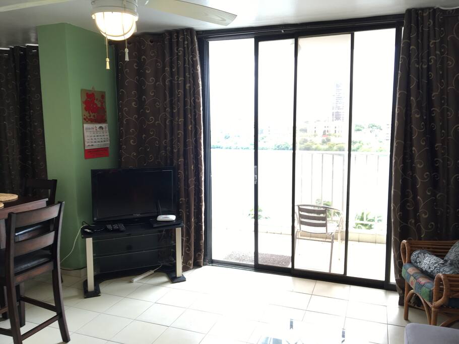 Living room with a view of the balcony to the Condado lagoon.