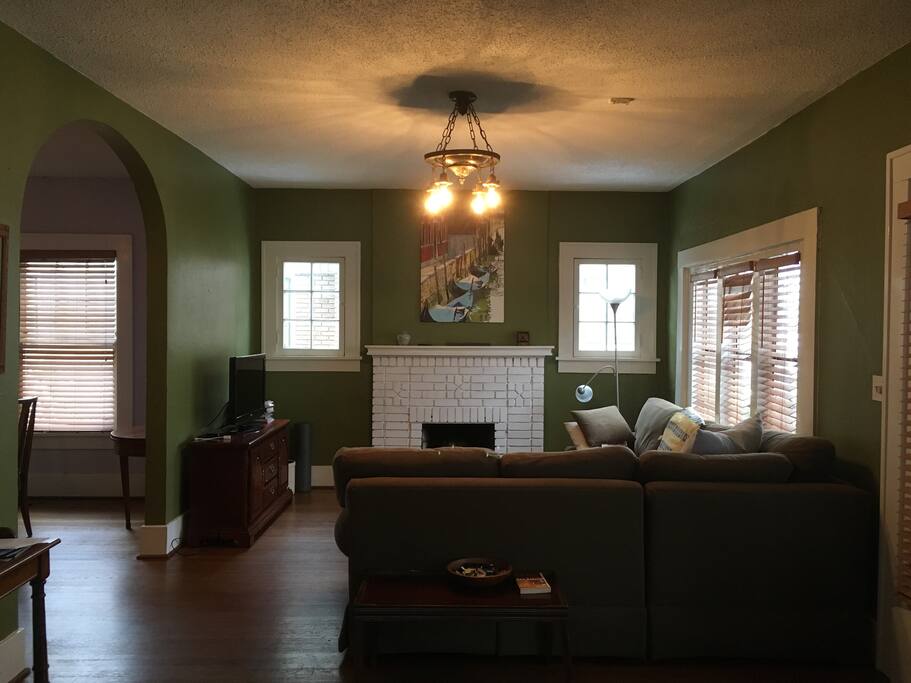 Large living room with Apple TV.