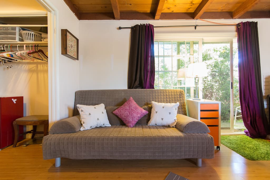 Lounging spot, futon which reclines in to a comfy Queen bed.