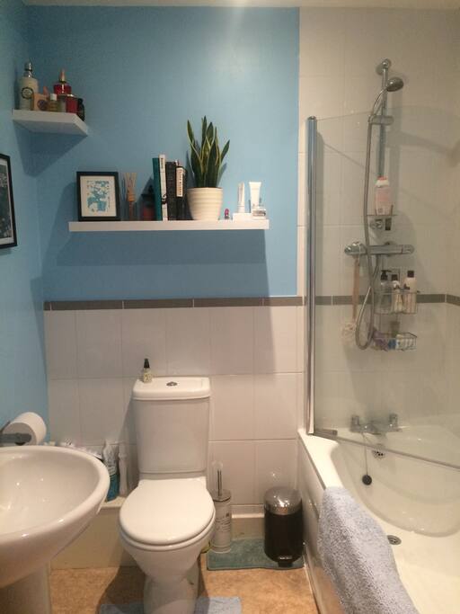 Private bathroom with shower and bath.