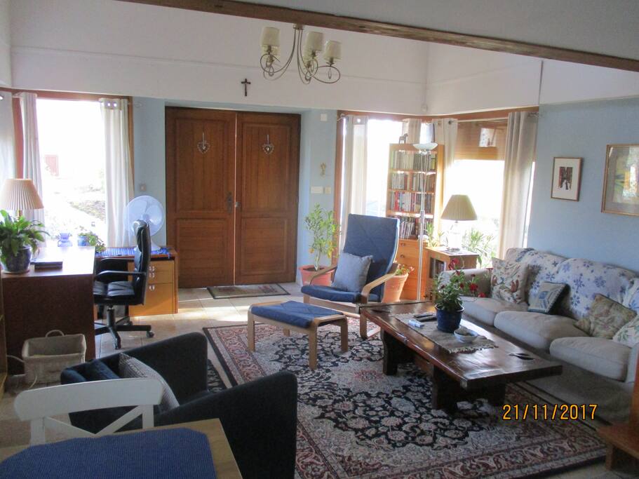 Large living area w/desk, sofa, etc.