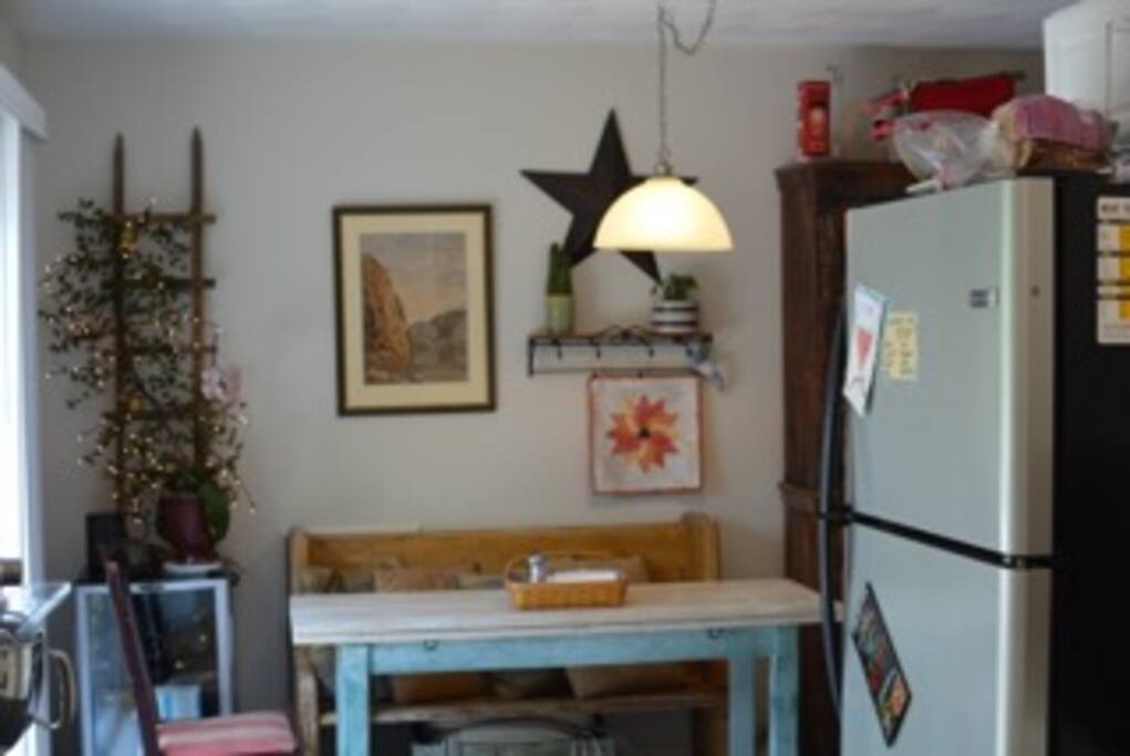 Cozy kitchen area is ready for a cup of coffee or a good conversation while preparing a meal during your stay.