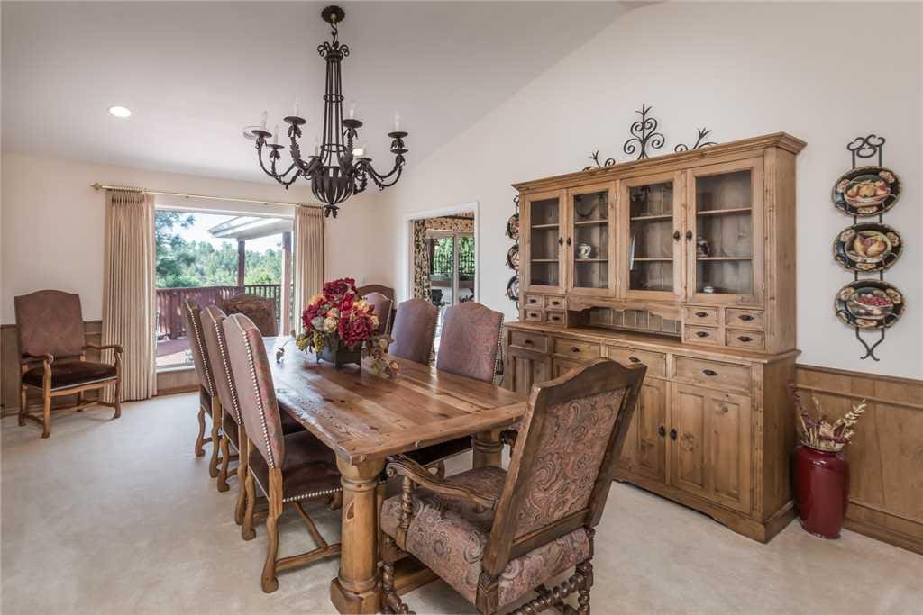 Elegant Dining - This elegant dining table with room for 8 is perfect for indulging in a family feast!