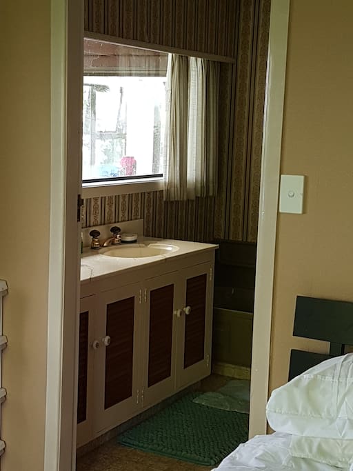 Bathroom with bath and shower and toilet