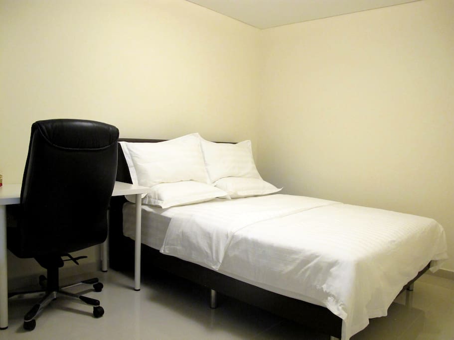Work desk, and Queen Size Bed to sleep two