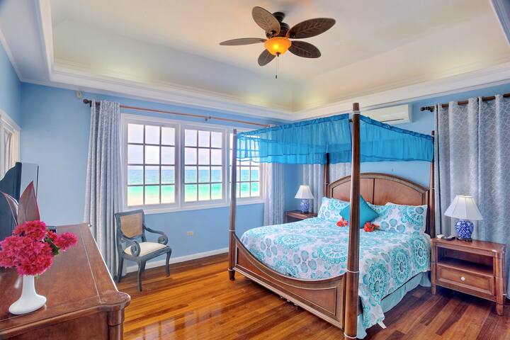 Your bedroom is furnished with a four-poster kingsize bed. Air-conditioned, ceiling fan. Luxurious timber floor.