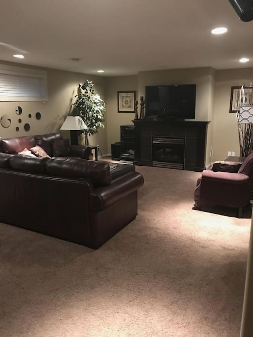 Private Family Room - enjoy a large screen TV/surround sound and the fireplace....making those evenings super cozy.