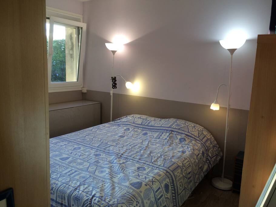 Purple bedroom with queen size bed