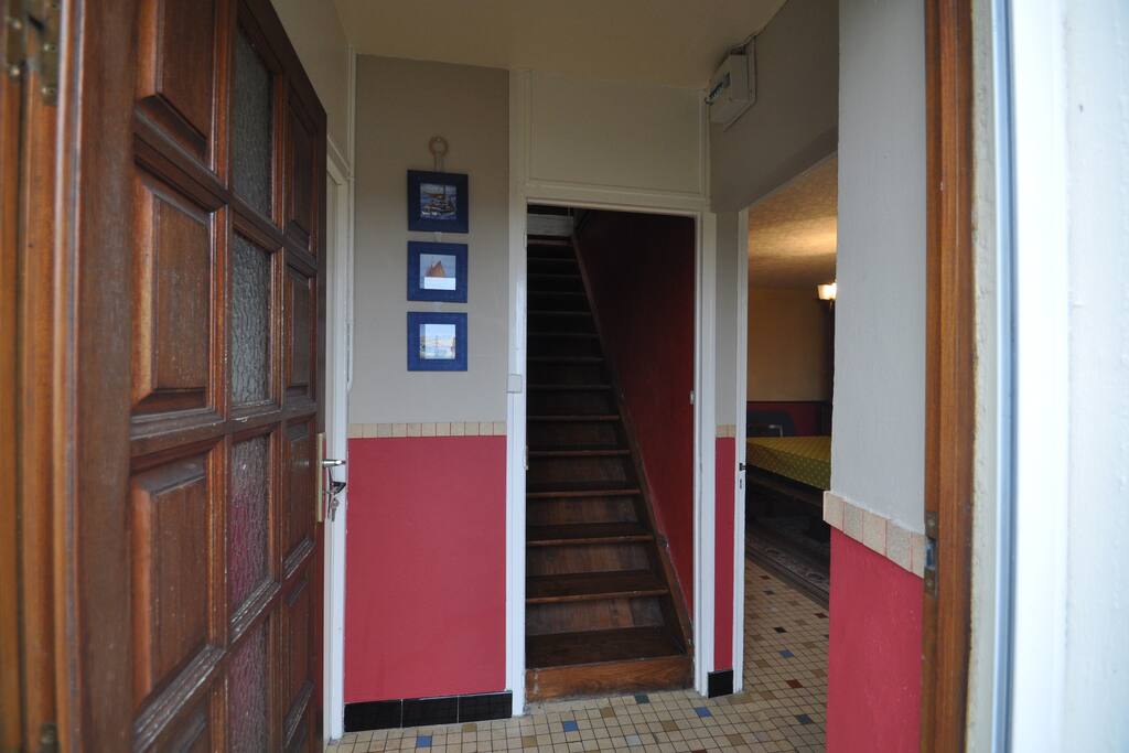 Entrance. Bedroom 1 to the left. The dining room to the right. Bedrooms 3 & 4 plus large living room upstairs.
