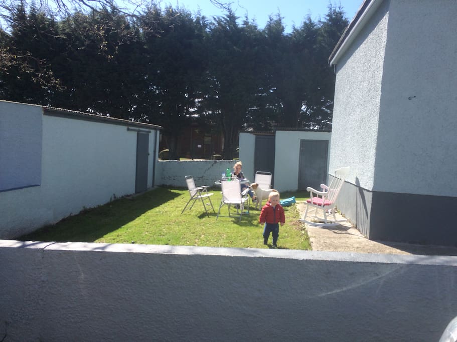 Back garden enclosed full size football field to use behind this