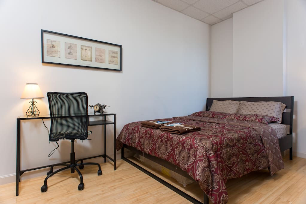 First bedroom with a queen-size bed.