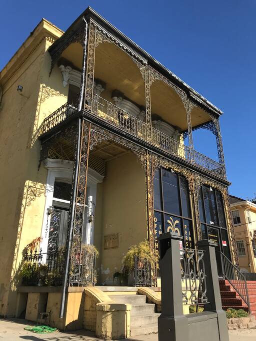 Front of building with private balcony shown