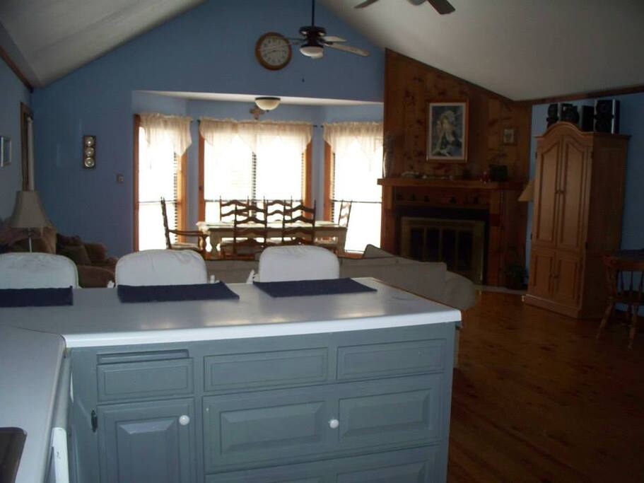 Open floor plan with cathedral ceiling.