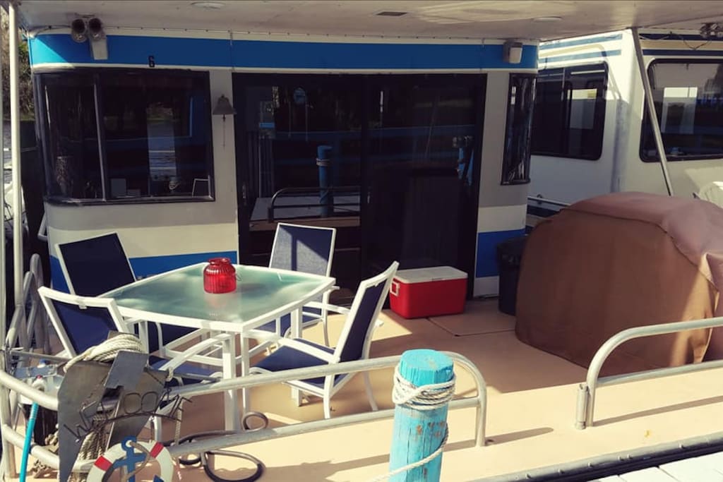 The forward deck features a gas grill, cooler and 4-top table. Great place to enjoy lunch or dinner.
