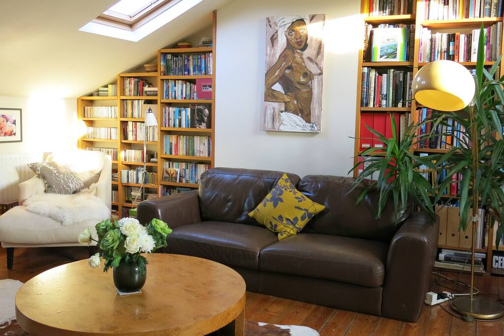Sun-filled sitting room with access to small roof terrace