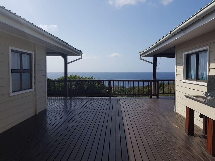 Two units joined by a deck- you can rent out both!