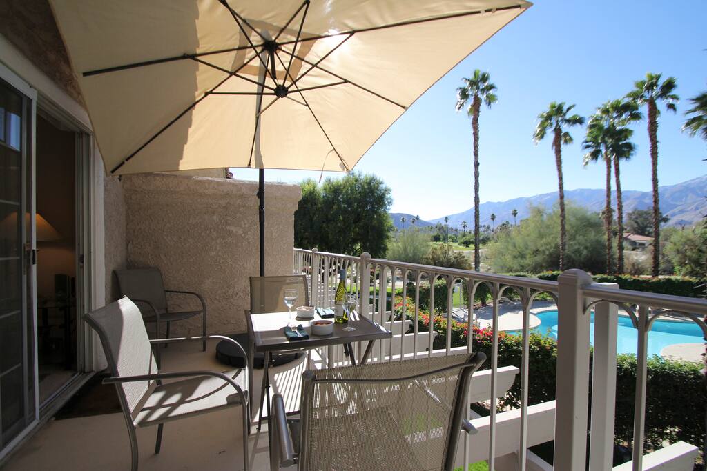 Umbrella to offer you shade on the balcony.