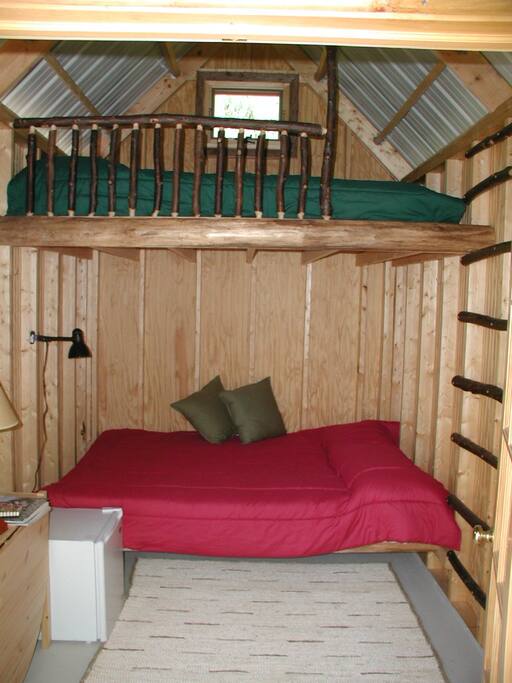 Each cabin has 2 queen bunk beds and the extended cabins have an additional twin bunk