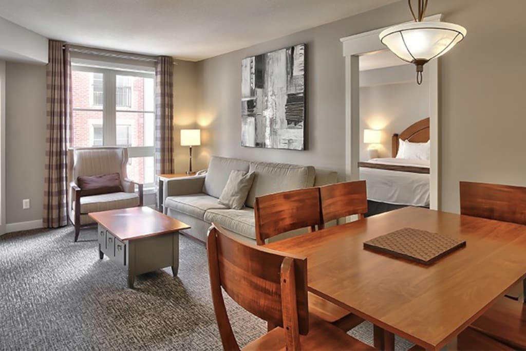 Enjoy meals together at the large wooden dining table