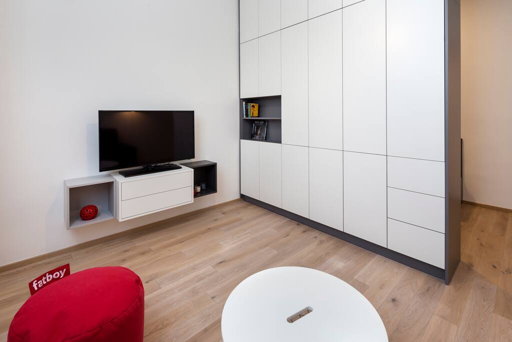 Living area with TV and our "magic wardrobe", where you can find many useful things:)