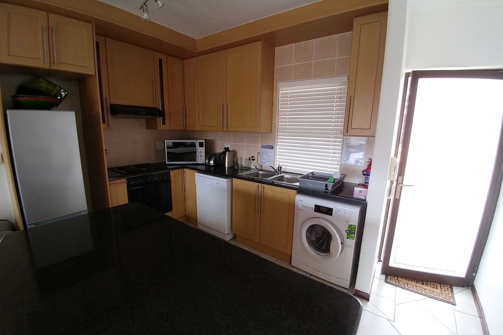 Front door and fully equipped kitchen inc. washing machine & dishwasher
