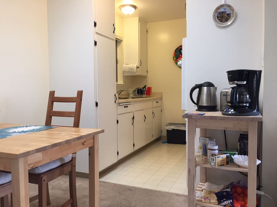 Dining table seats 4 with full kitchen access