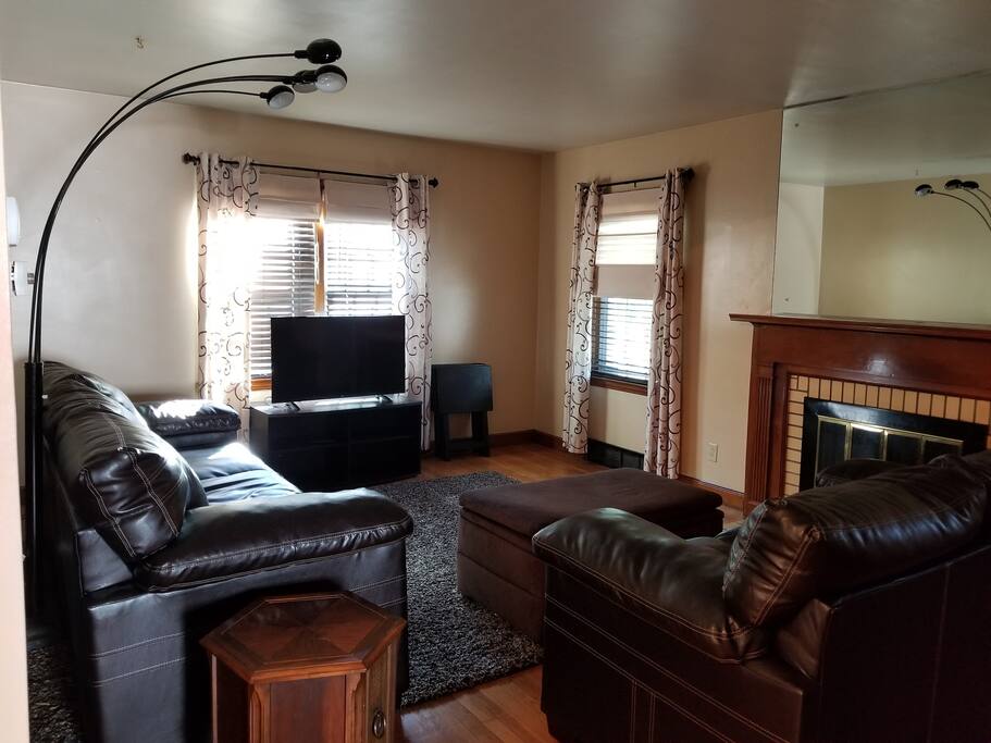Living room with sofa, loveseat, flatscreen tv, cable and wifi