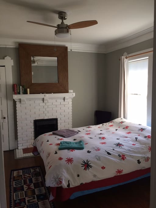 The master bedroom with a queen size bed.