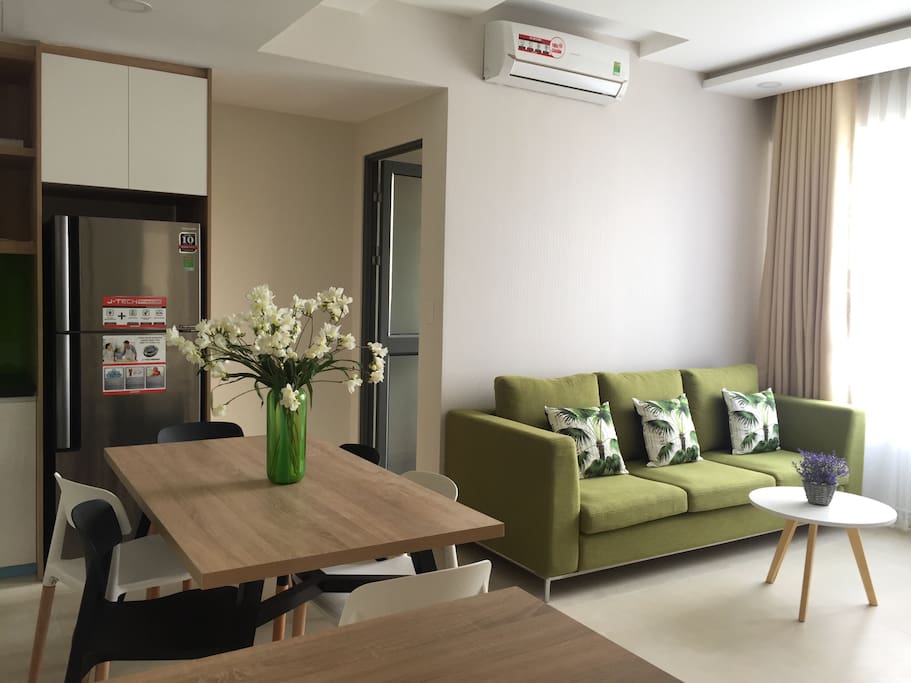 dining table and sofa in living room