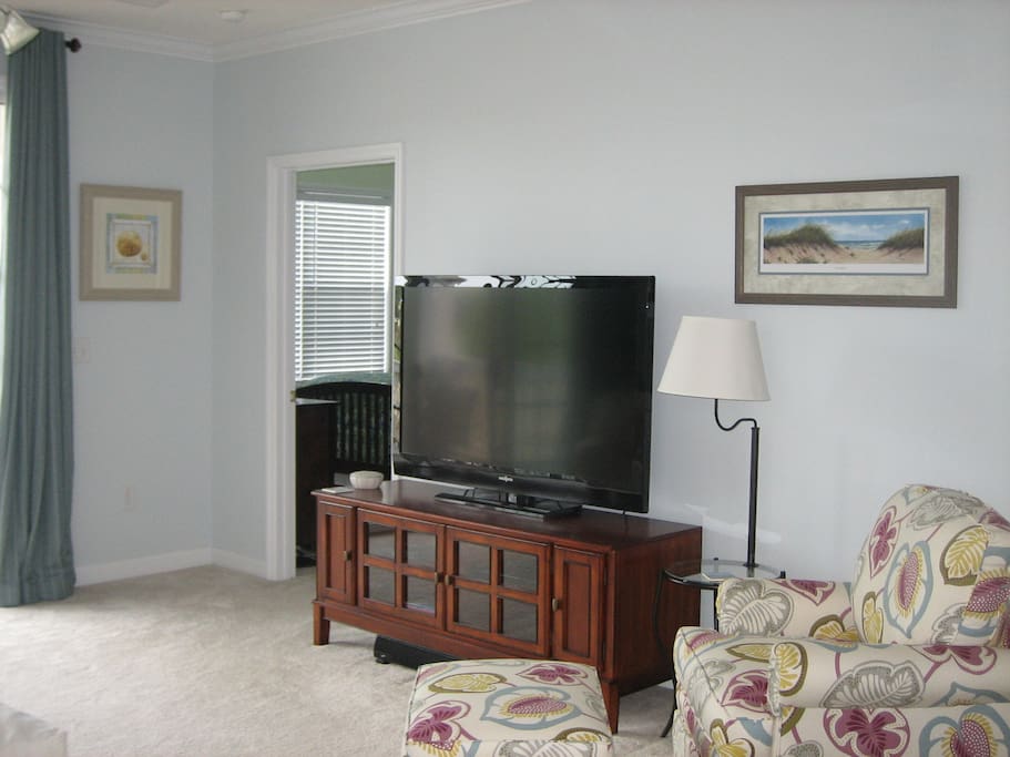 55" flat screen TV, Blu-Ray DVD player too.