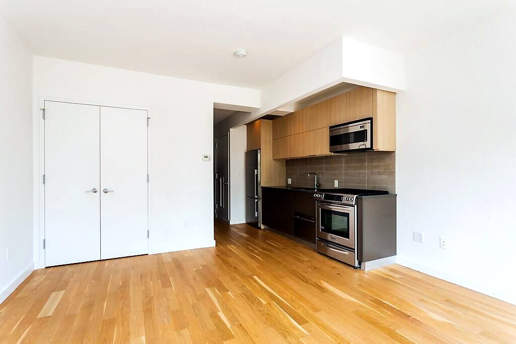 Apt is furnished now, this is from the building website as I am at work. This is my apt before I moved in, now TV nice bed lounge chair and desk here