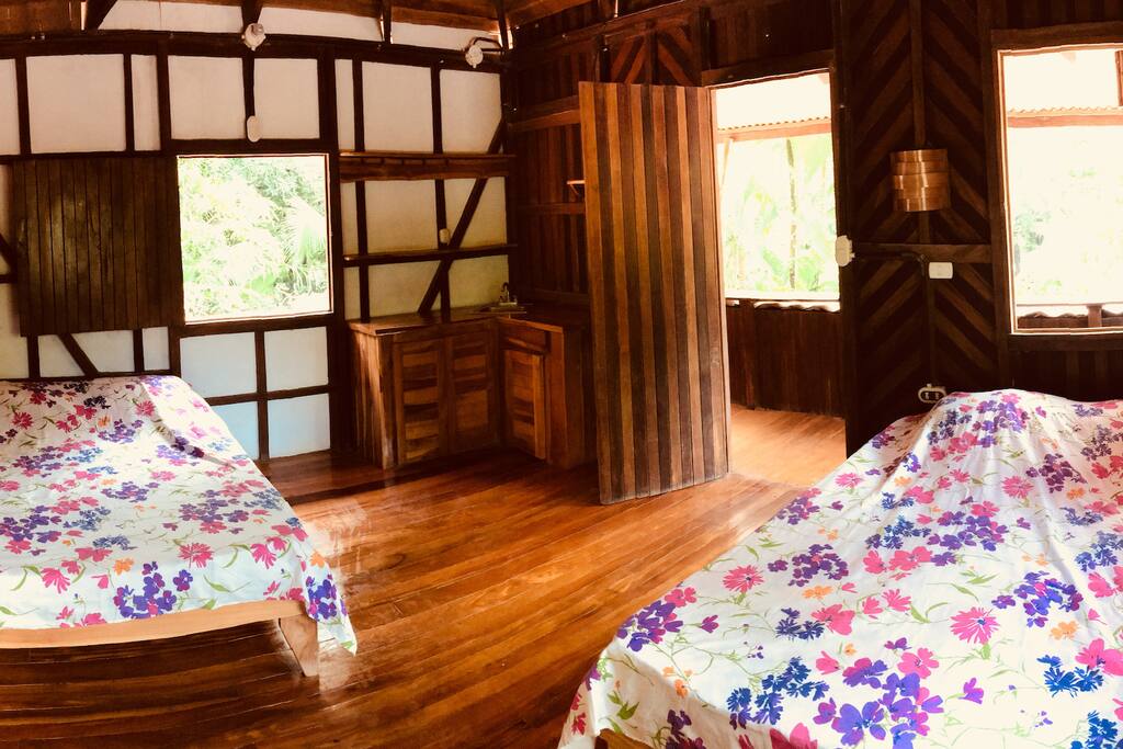 Suite with two double beds and balcony