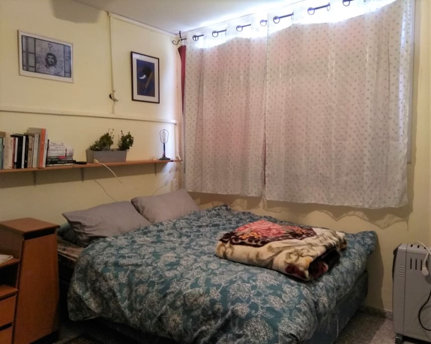 The bedroom with queen bed