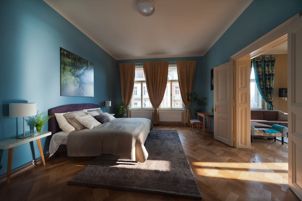 Airy bedroom with beautiful light all day long, blackout curtains for sure.