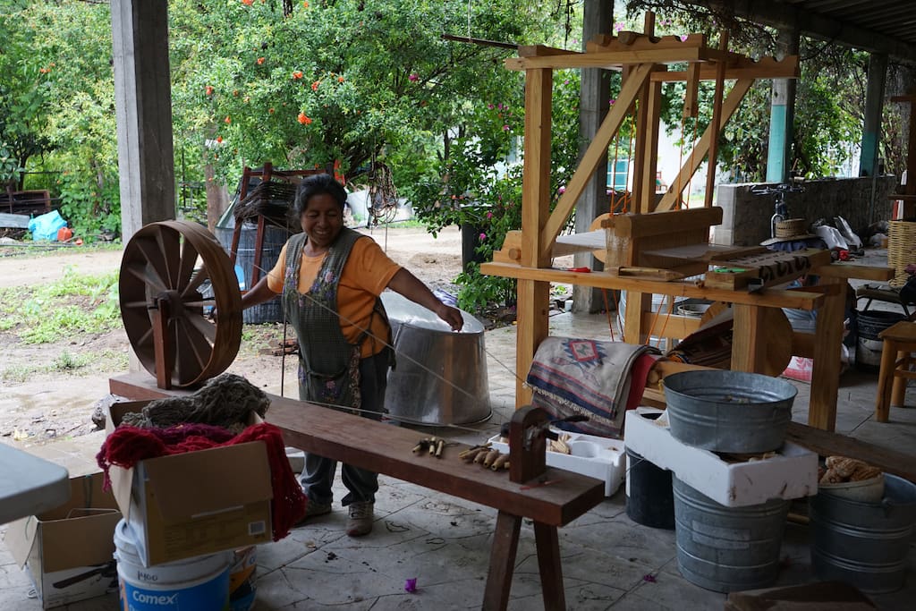My mom coiling yarn for her rug, she was determined to finish it that same day, which she did of course!