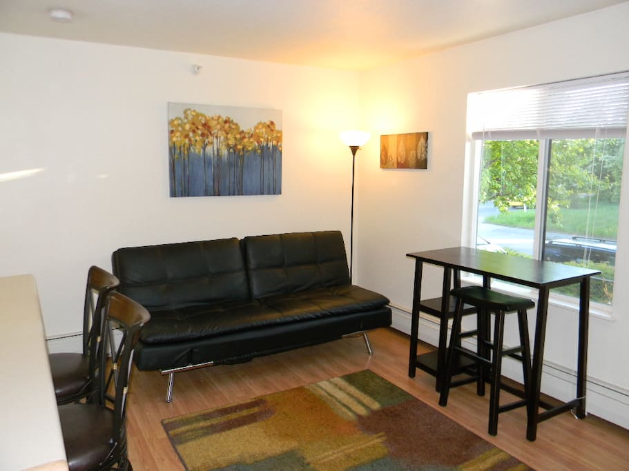 Futon couch can be converted to sleep 1-2 additional guests.