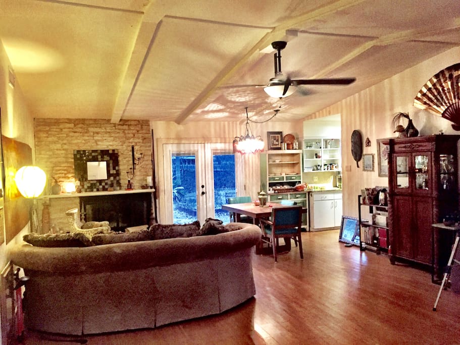Fireplace with dining and kitchen off to the right