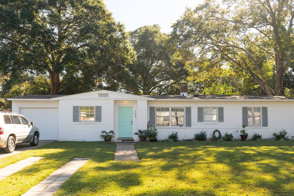 New landscaping! Cute art-deco style upgrades. Parking for 3 cars, and more room on the street.