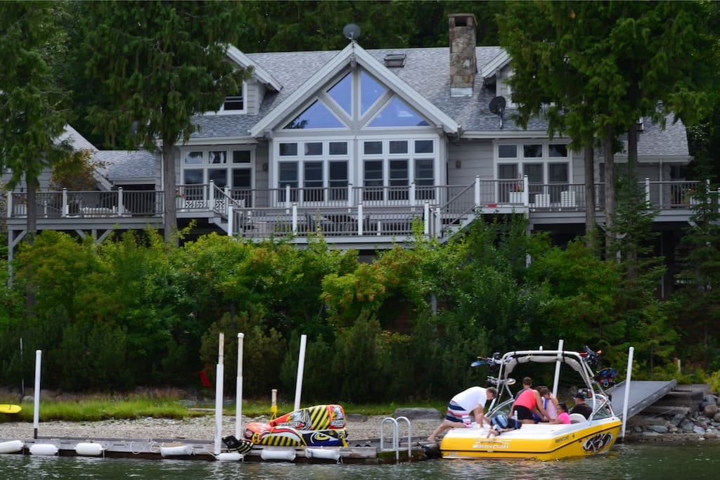 View of Boat Dock with guests ski boat