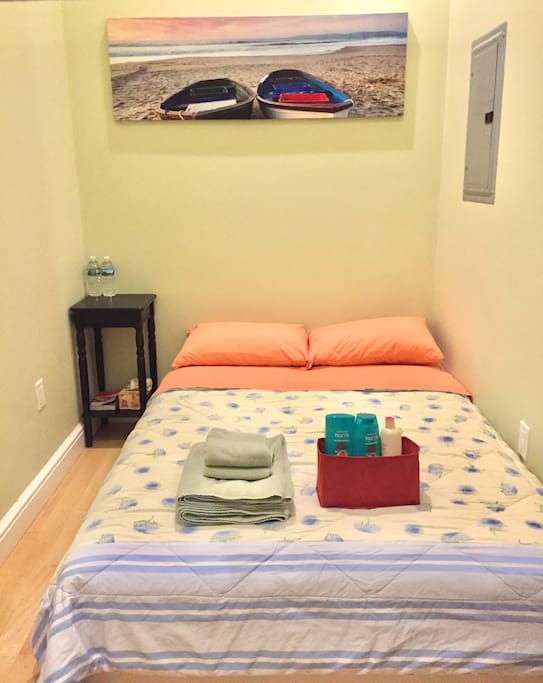 Your bedroom with towels and toiletries
