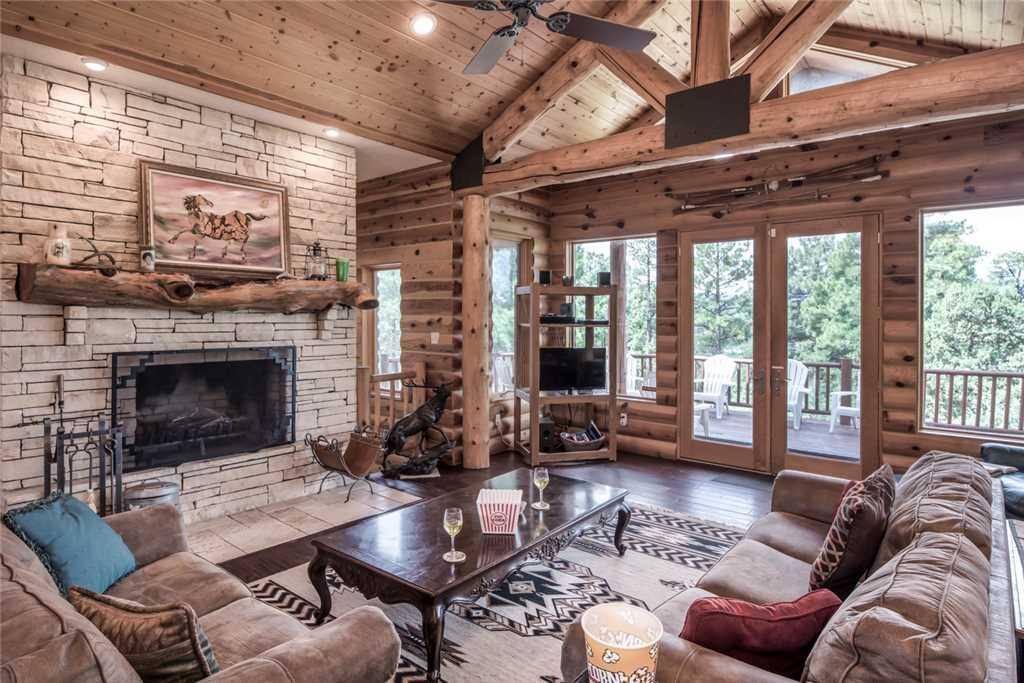 Living Room - The living room is very bright and inviting with plenty of space and high ceilings.