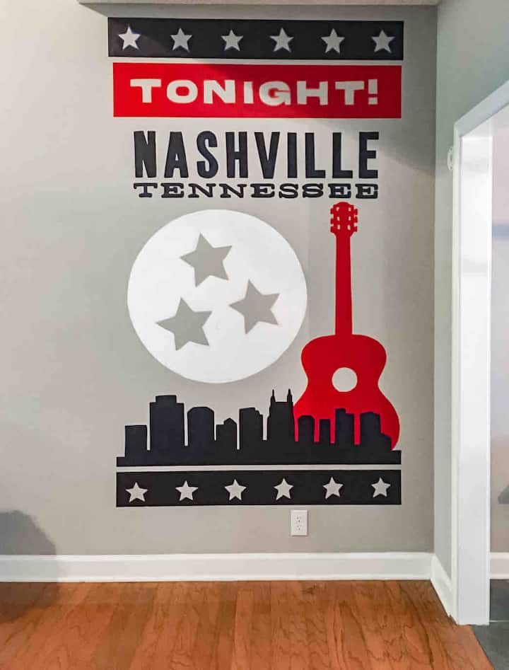 The perfect backdrop for your group pictures. Custom mural painted by the same artist who painted the famous murals around town - Music City Murals!