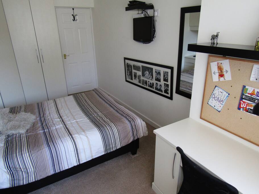 Includes TV and Large Desk