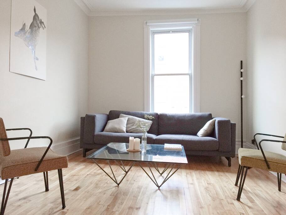 Living room with big 8 feet sofa