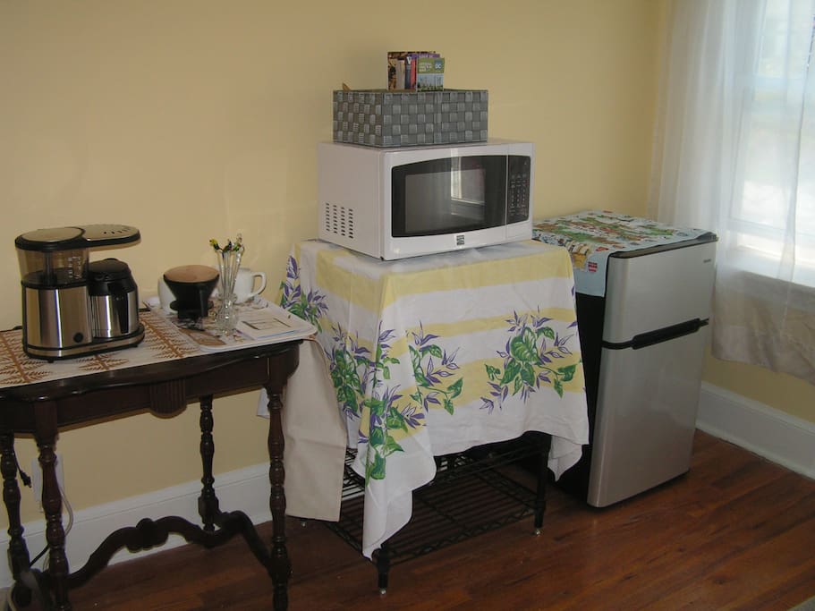 Mini fridge/freezer, microwave and coffeemaker.