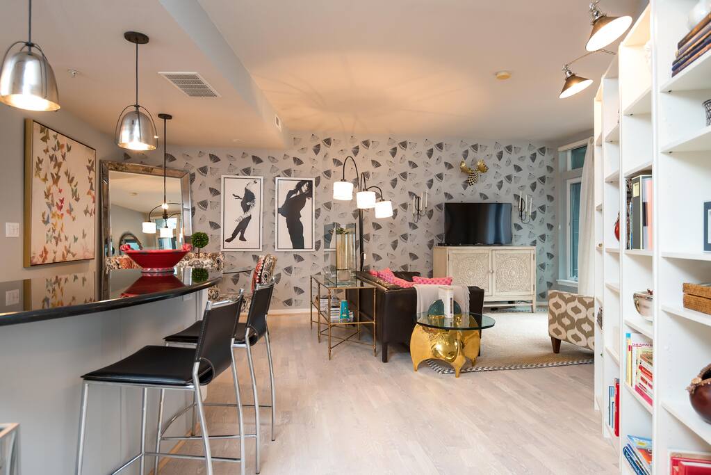 Kitchen, dining, living room, with patio to the right