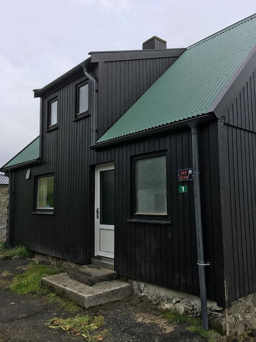 The house lies at the end of the road in Múla, parking space available