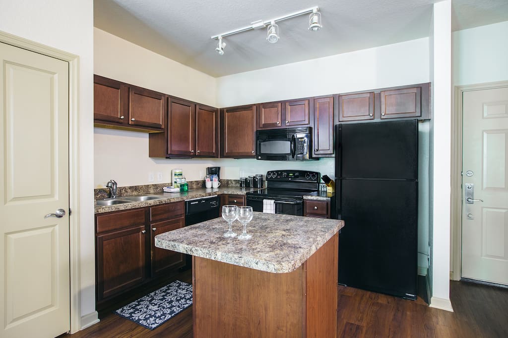 Kitchen with Granite Countertops and Island